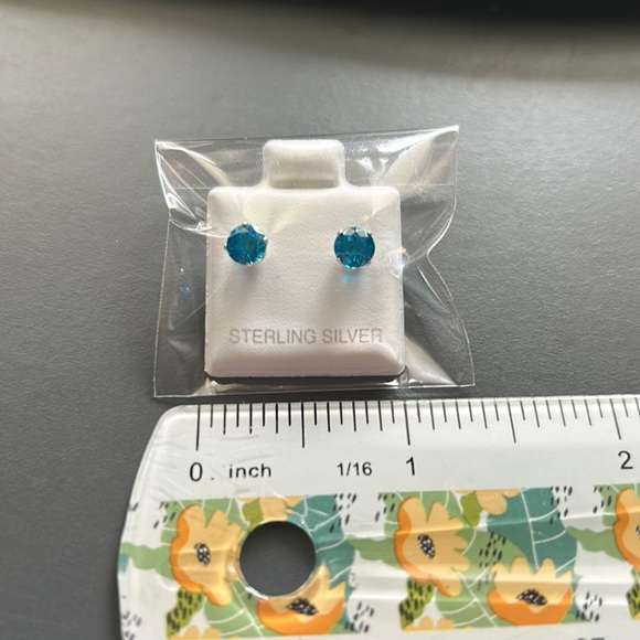 Sterling Silver 4MM Topaz Stud Earrings - Picture 1 of 1